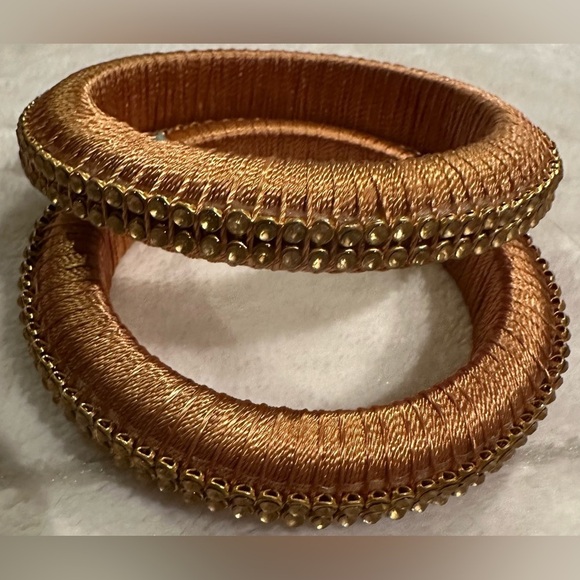 Jewelry - Cord covered brown and gold bangle bracelet set - set of 2.